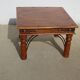 Square coffee table in exotic wood and wrought iron.
