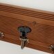 Wall coat rack with 4 hooks – Grooved wood and black ceramic