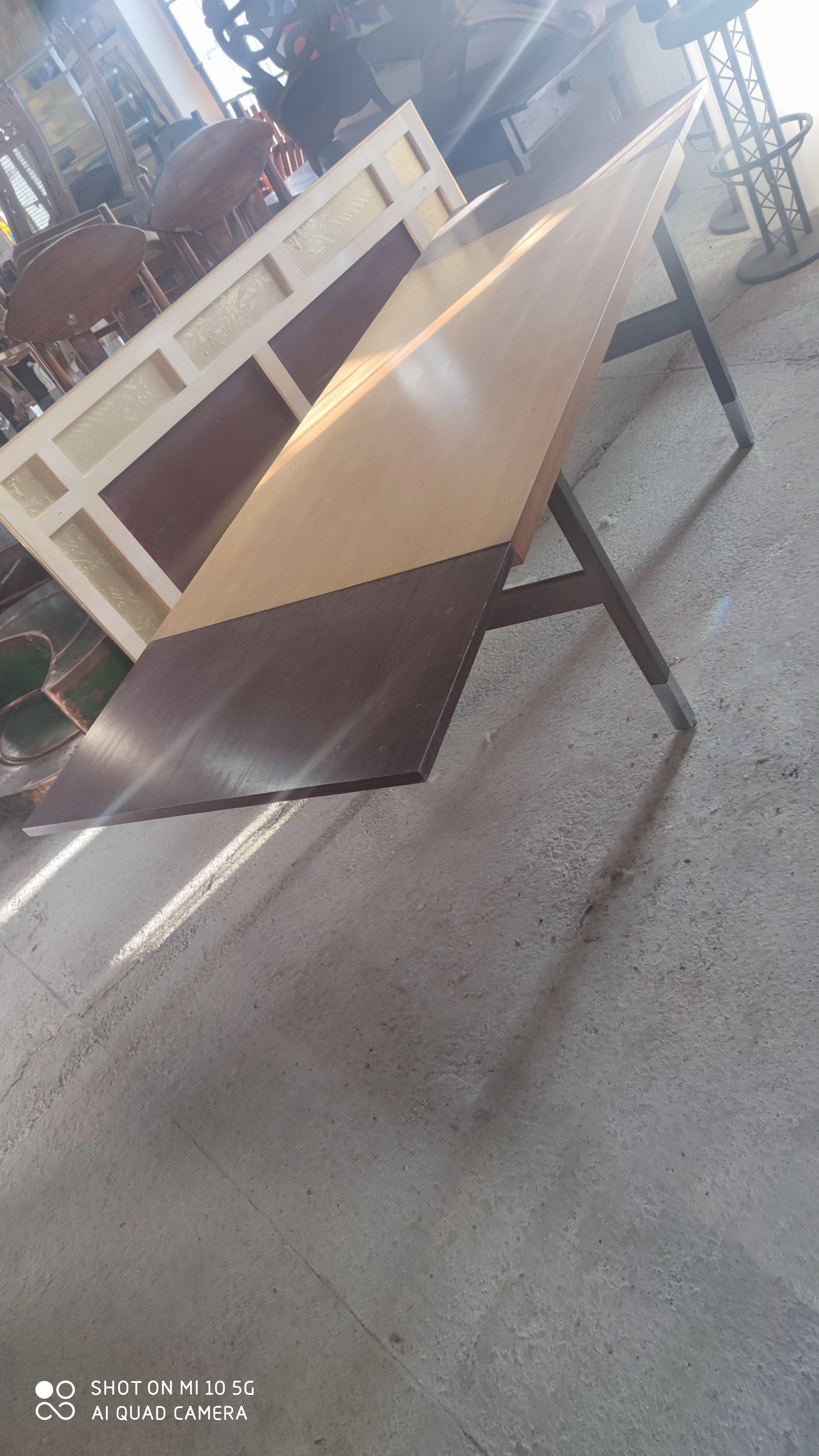 Extendable dining table in walnut, mahogany and chrome, circa 1960