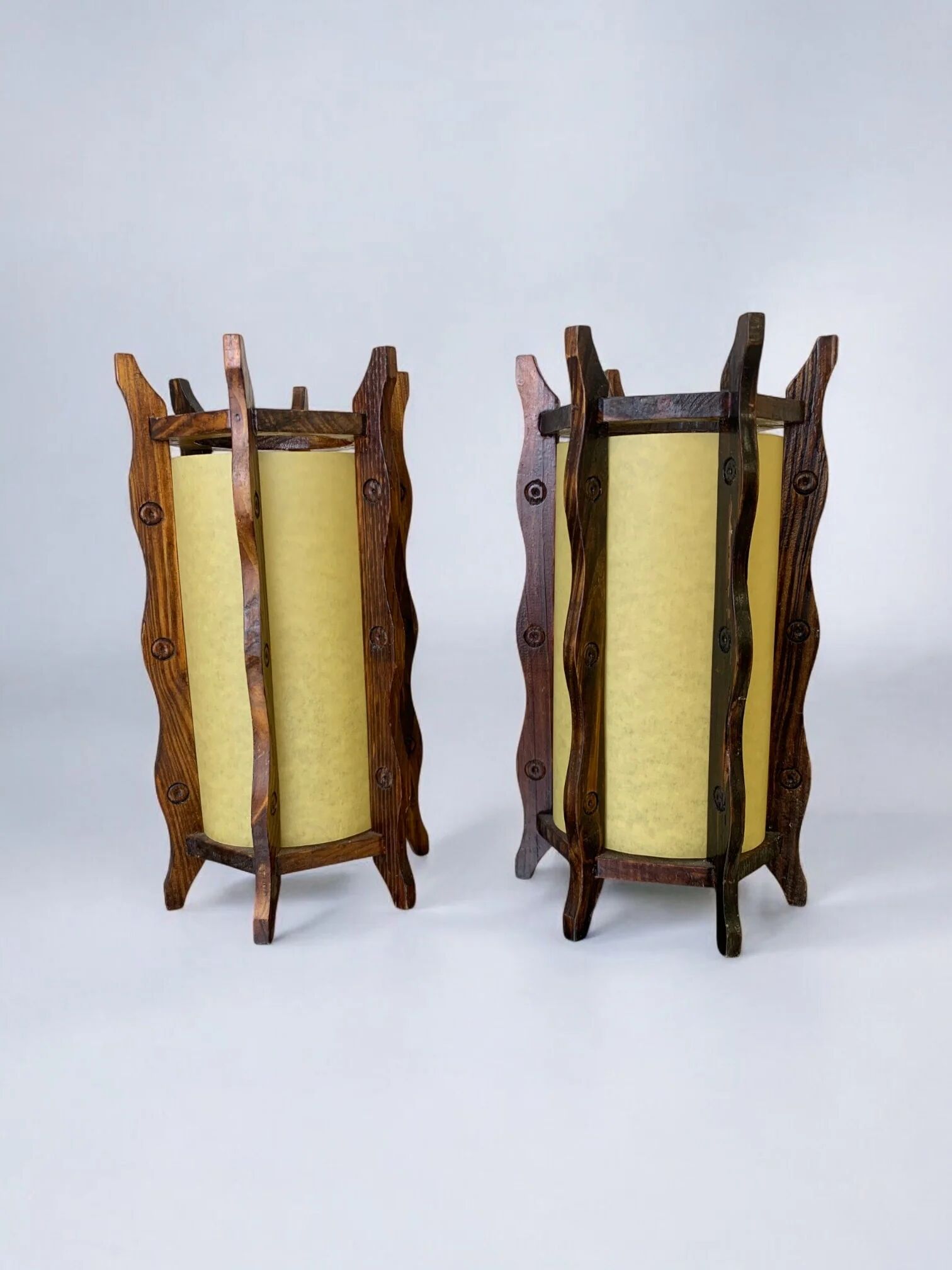 Pair of brutalist table lamps, wood & parchment, France, 1970s