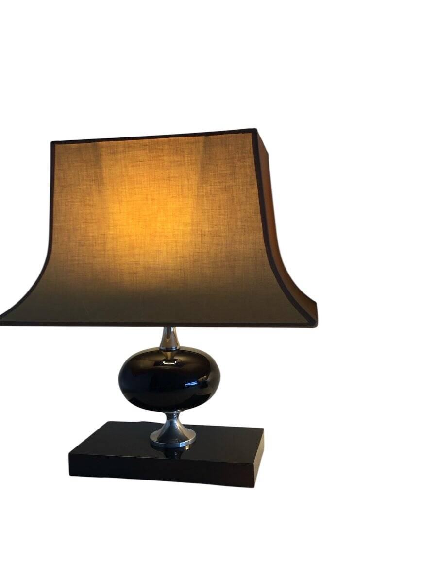 Pair of lamps, resin and chrome steel, by Philippe Barbier, circa 1970.