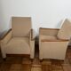 Pair of armchairs in carved wood and vintage fabric