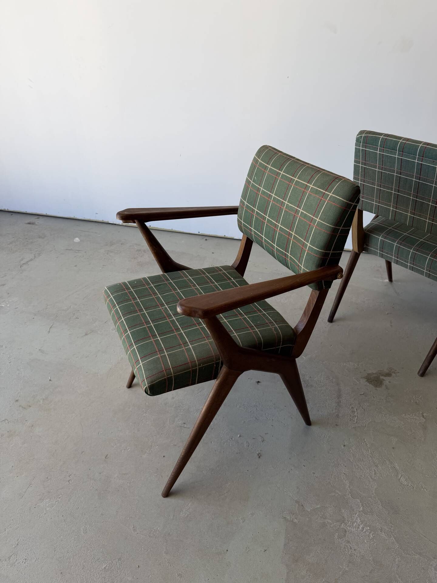 Pair of armchairs with a Scandinavian design in vintage teak from the 1960s.