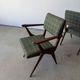 Pair of armchairs with a Scandinavian design in vintage teak from the 1960s.