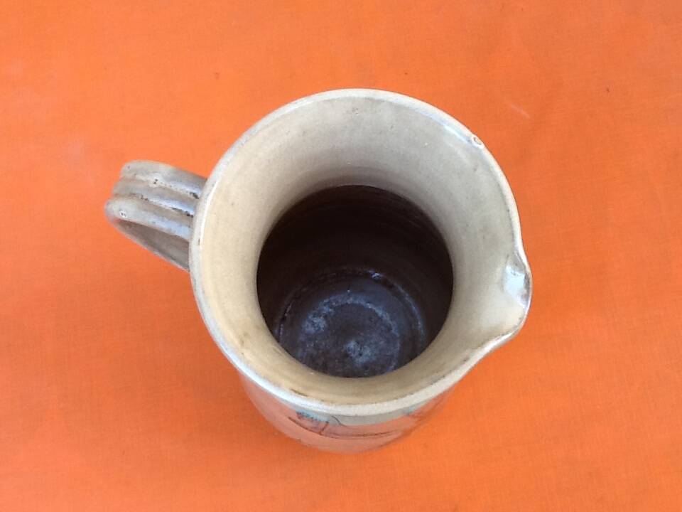 1960s Glazed terracotta pitcher with floral decoration