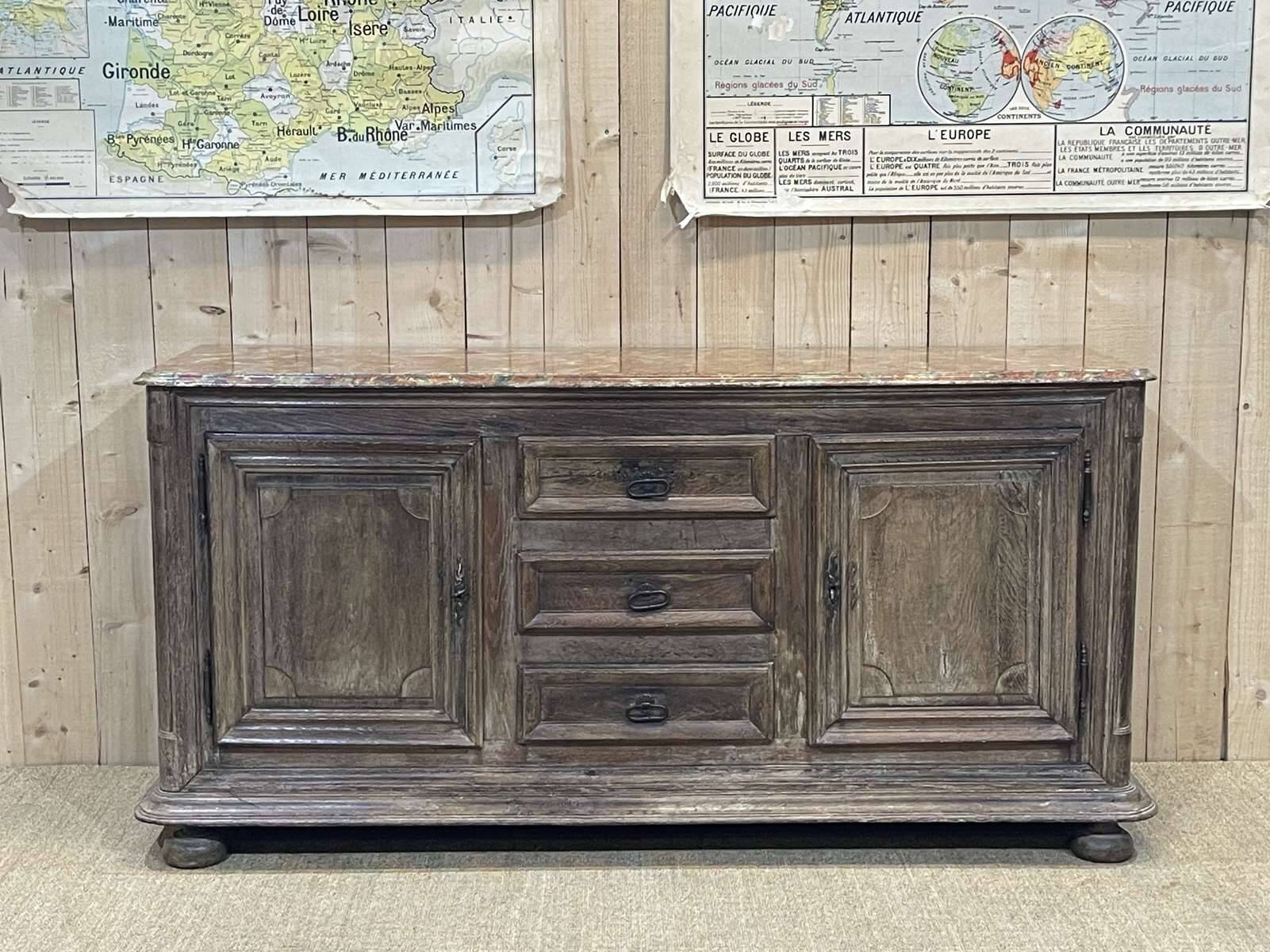 18th-century oak enfilade with a marble-effect painted top.