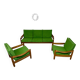 Living room sofa and Scandinavian design armchairs from the 1960s in green boucle.