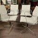 Suite de 4 fauteuils en cuir blanc Ray et Charles Eames