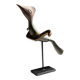 Traditional Indonesian decorative wooden bird on a base, crest model.