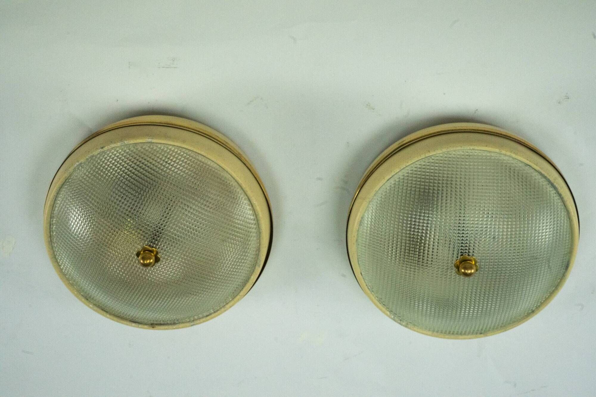 Lumi Milano, pair of wall or ceiling lamps in glass, brass and lacquer, 50s