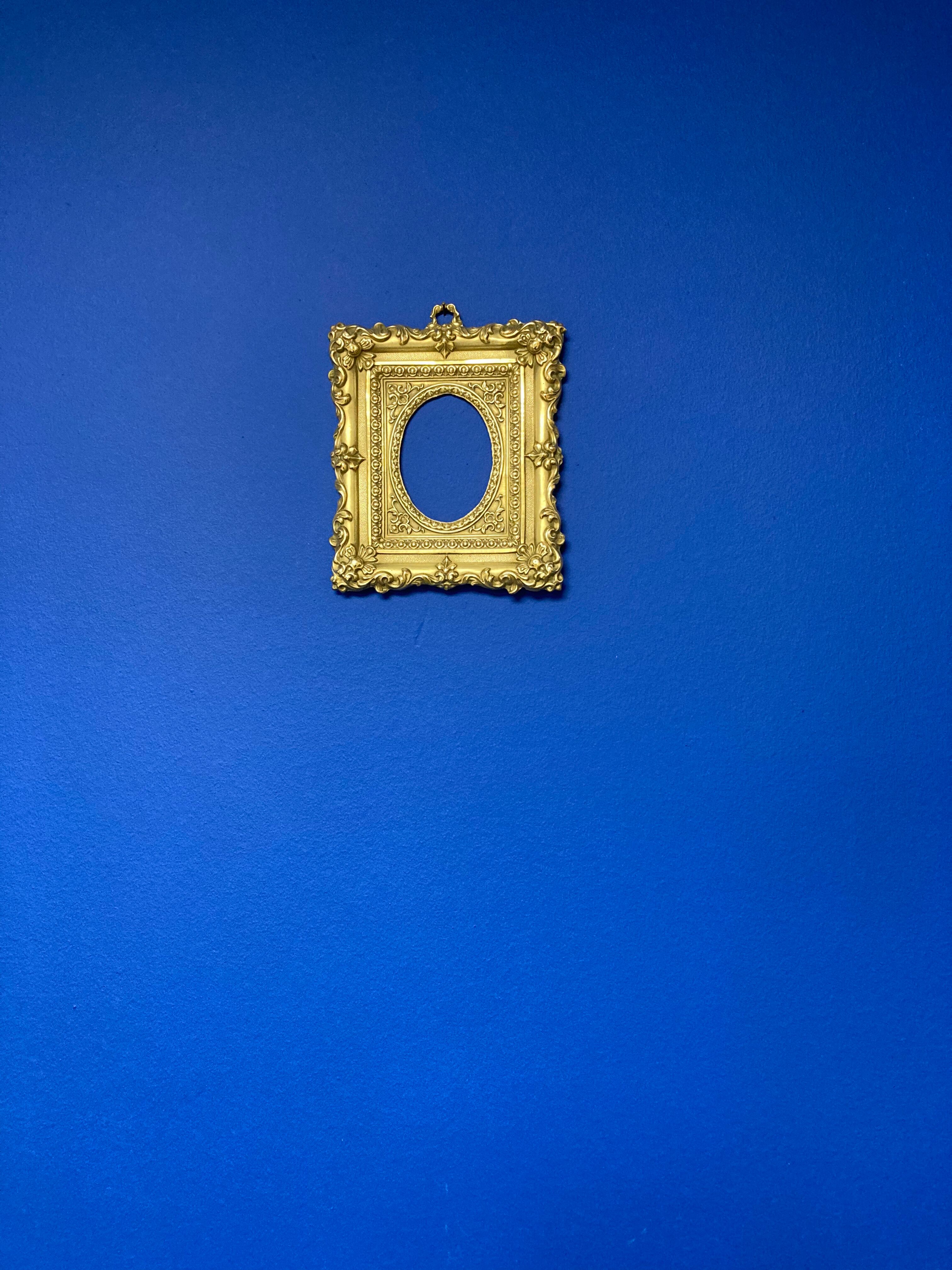 Pair of brass photo frames