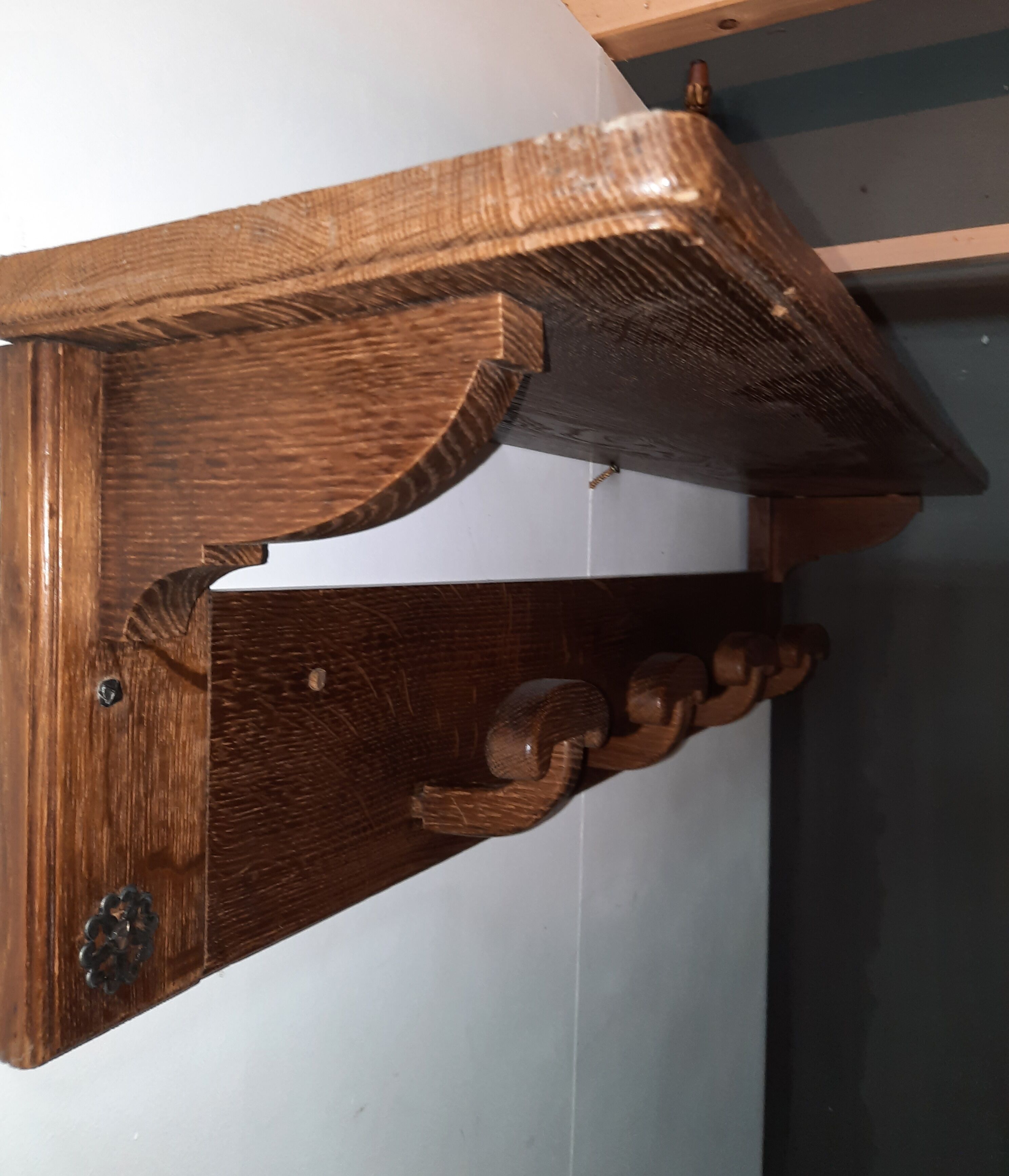 Wearing a brutalist style wooden wall coat