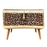 Vintage storage stool with compass legs in white faux leather and leopard velvet.