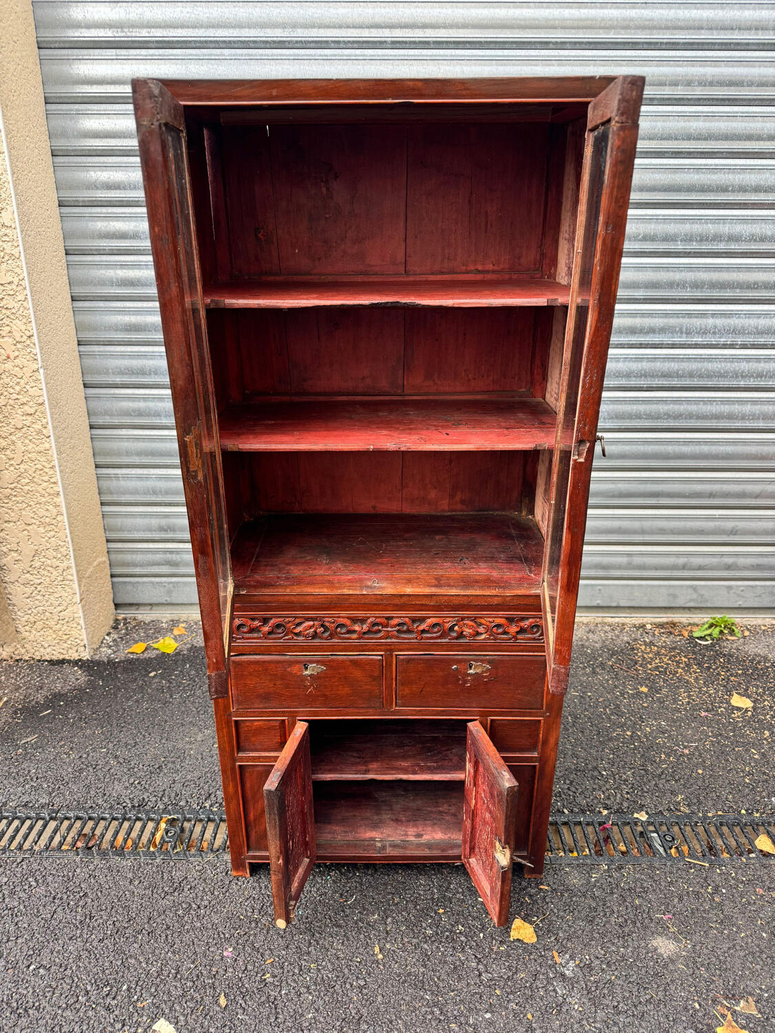 Attractive two-part Indochinese display cabinet. Mid-20th century