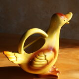 Ceramic watering can in white earthenware, yellow enamel and bird shape