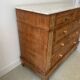 Sandblasted chest of drawers with white marble top