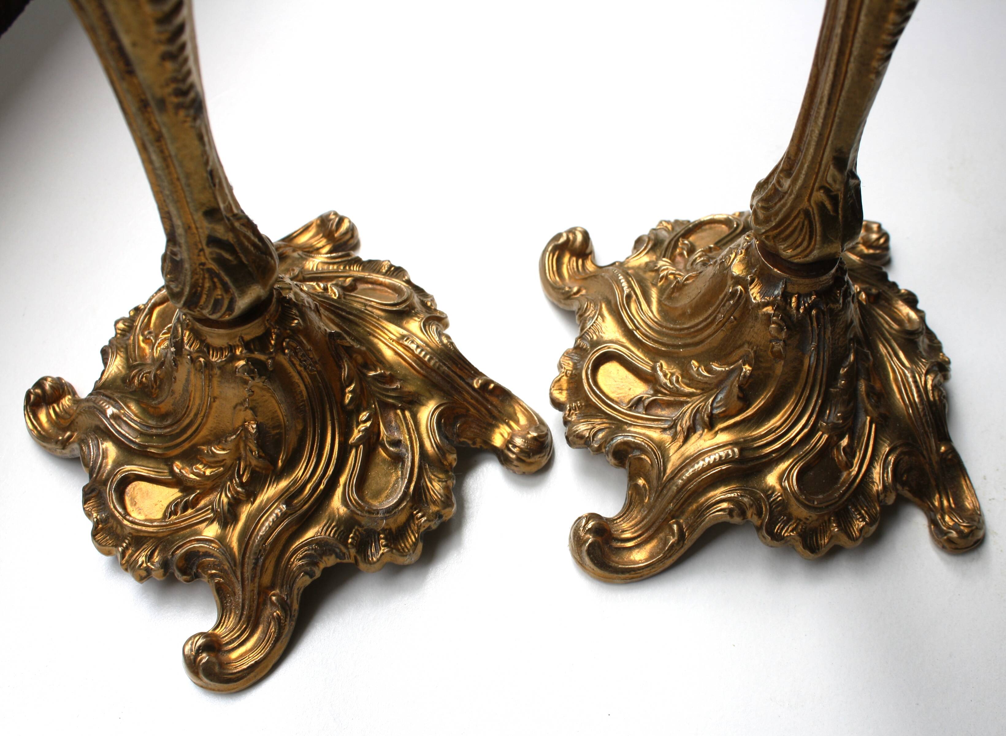 Pairs of Louis XV style gilded bronze candlesticks