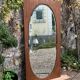 Miroir oval biseauté sur porte art déco Acajou 79x162