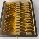 12 small silver-gilt spoons