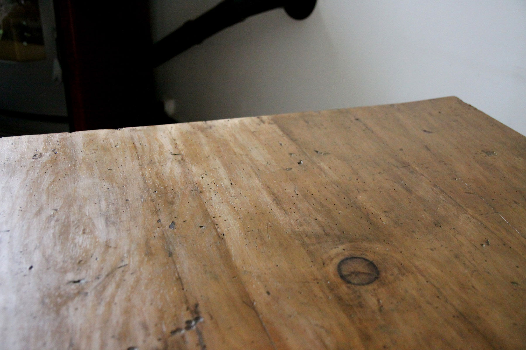 Patinated wooden dining table