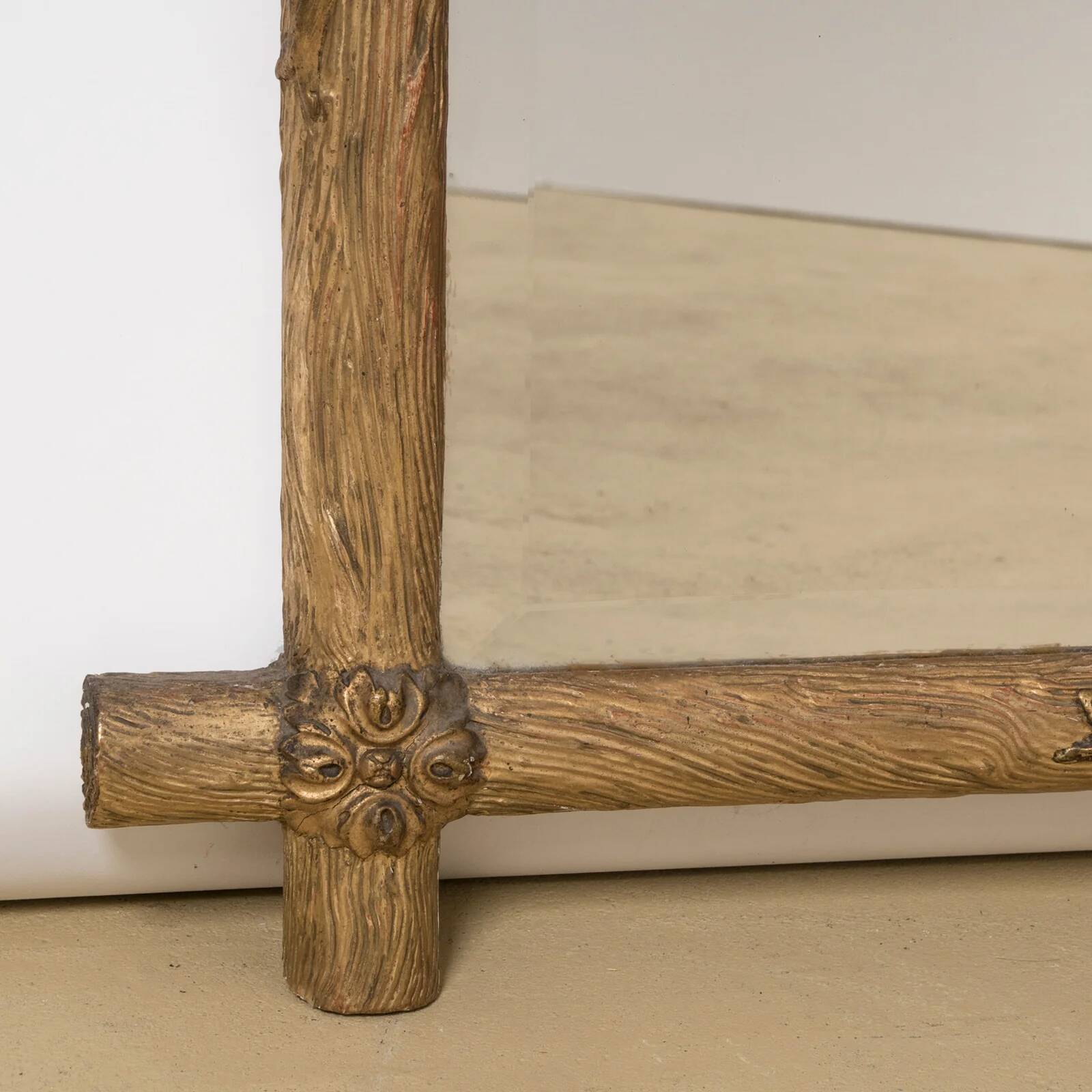 Antique faux wood mirror with bird's nest, 19th century