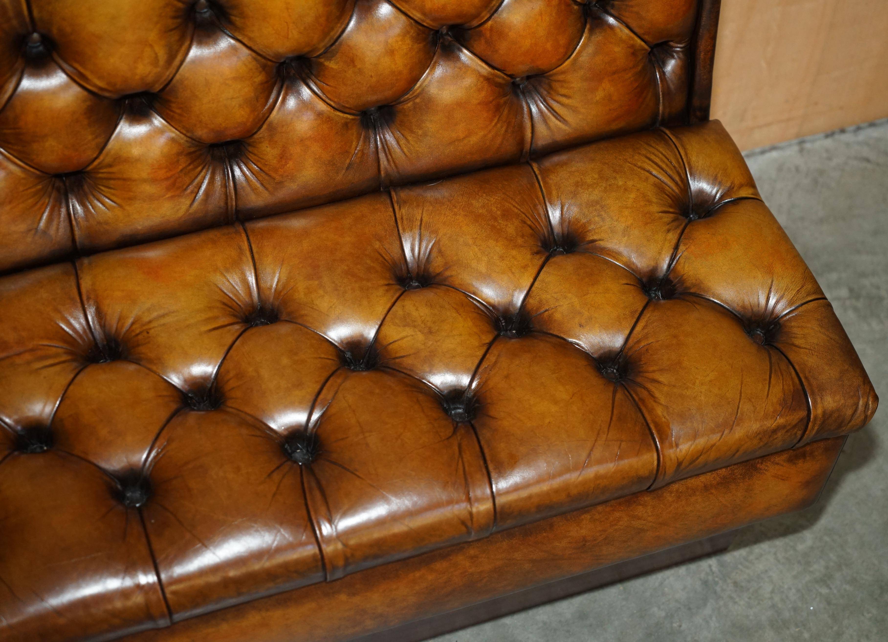 Pair of Victorian Chesterfield pub benches in leather.