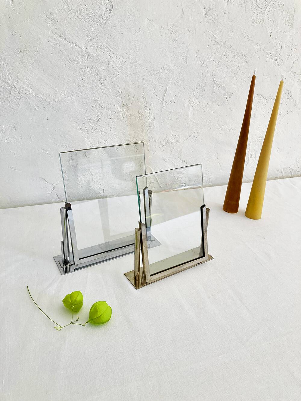 Duo of Art Deco photo frames in silver metal with beveled glass