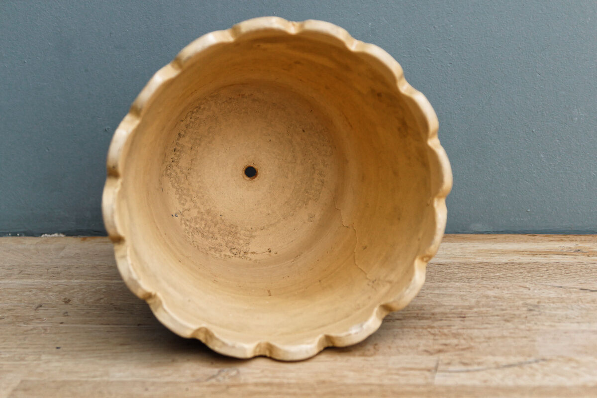 Vintage varnished sandstone pot cover