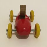 Old toy, red wooden car