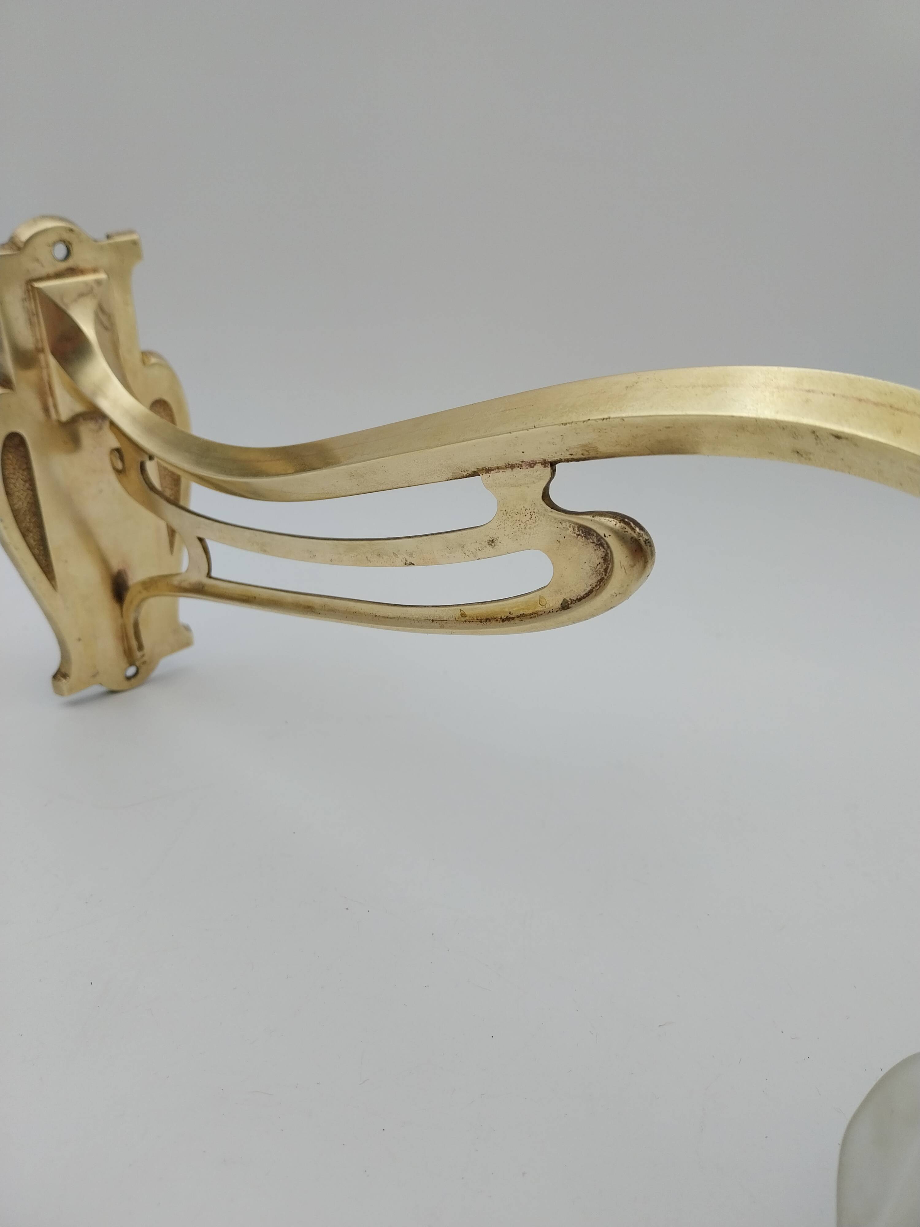 Art Nouveau bronze wall lamp with its rose-shaped glass paste tulip