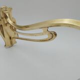 Art Nouveau bronze wall lamp with its rose-shaped glass paste tulip