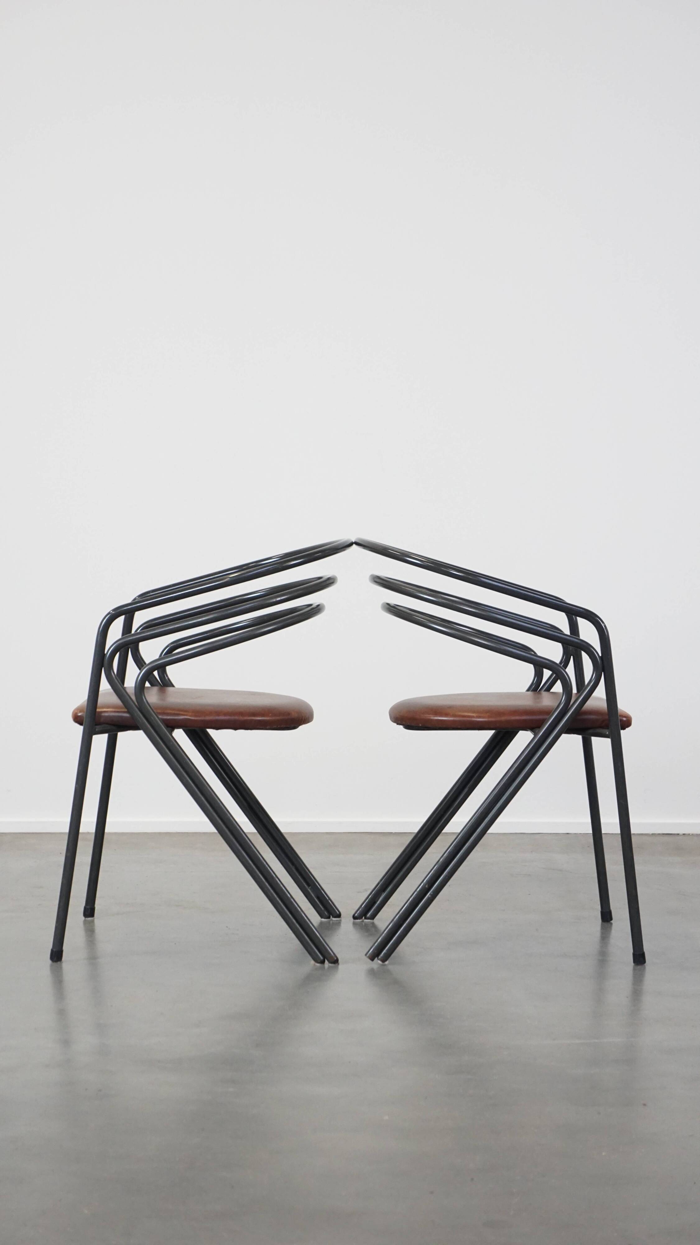 Set of 4 1970s design dining chairs with leather seats and metal frame