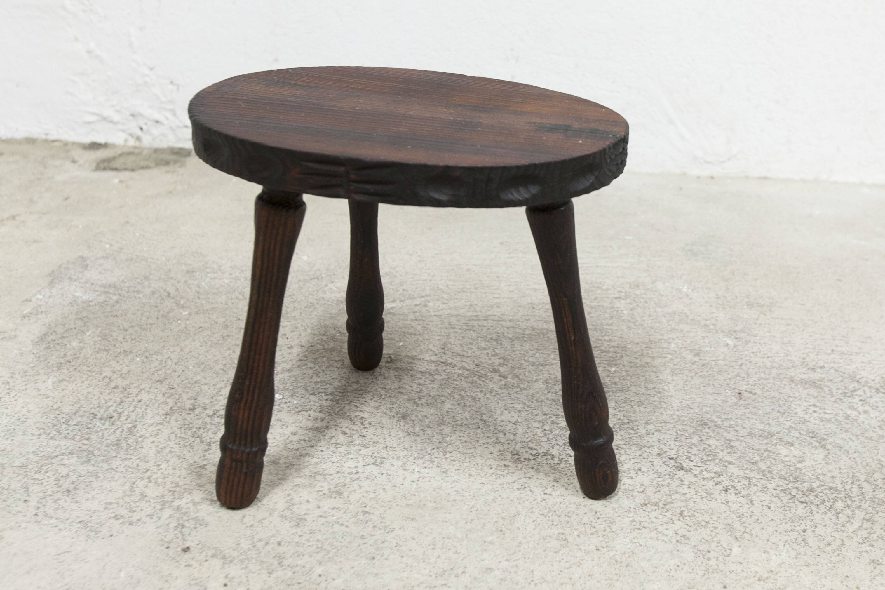 Low brutalist solid wood stool 1950