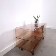 Vintage hifi, LP cabinet, TV unit made of tinted plexiglass on wheels, records.
