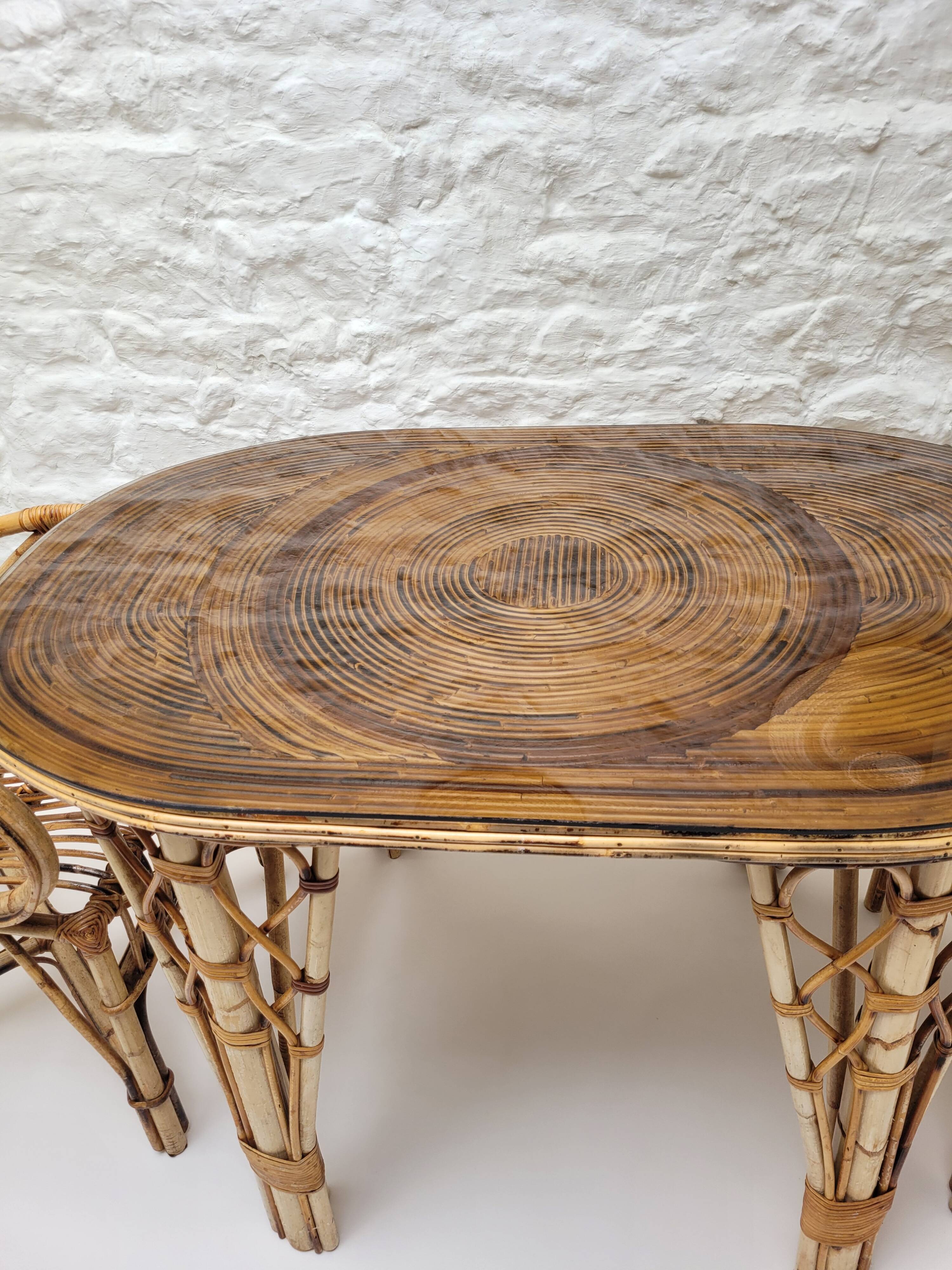 Audoux Minet duo table with bamboo rattan and smoked glass armchairs