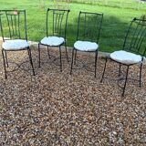 Wrought iron chairs with cushions