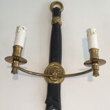 Pair of Black Lacquered Bronze Wall Lamps with Lions' Head Decorations. Around 1970