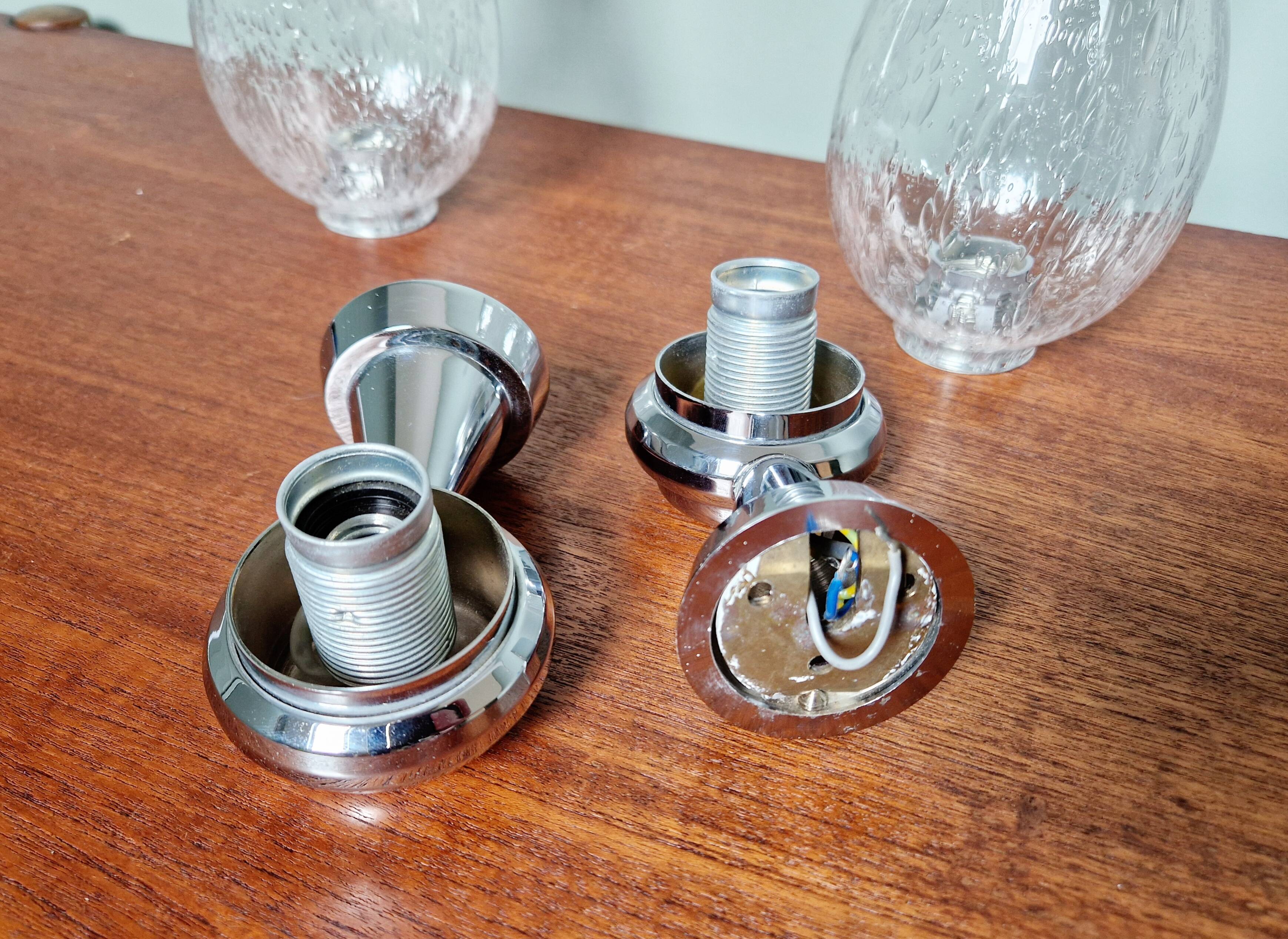 Pair of blown glass and chrome-plated metal wall lights, 1970s