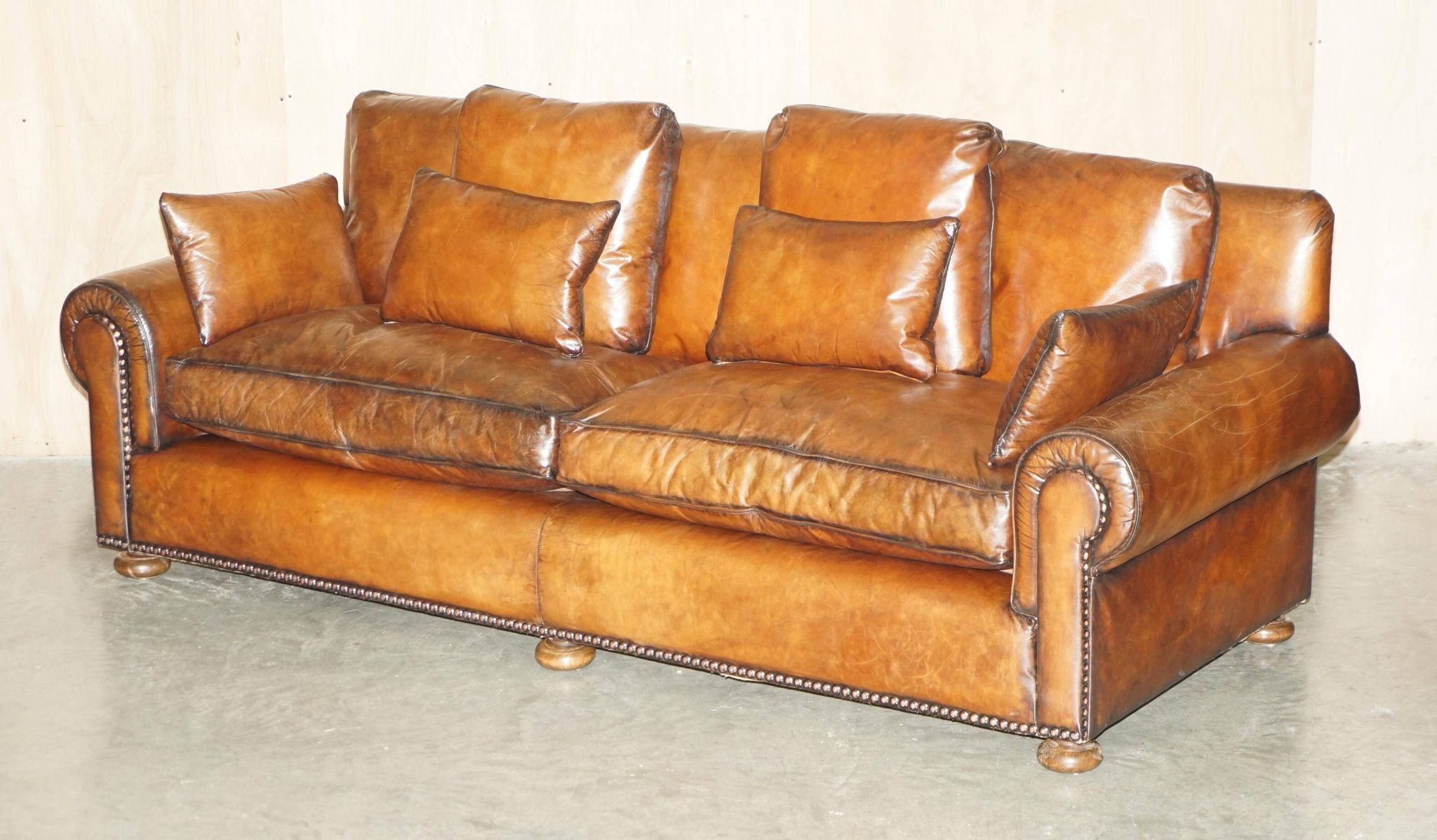 Pair of Ralph Lauren Jamaica club sofas restored in leather.