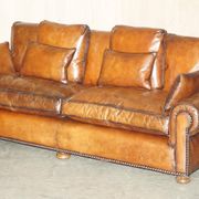 Pair of Ralph Lauren Jamaica club sofas restored in leather.