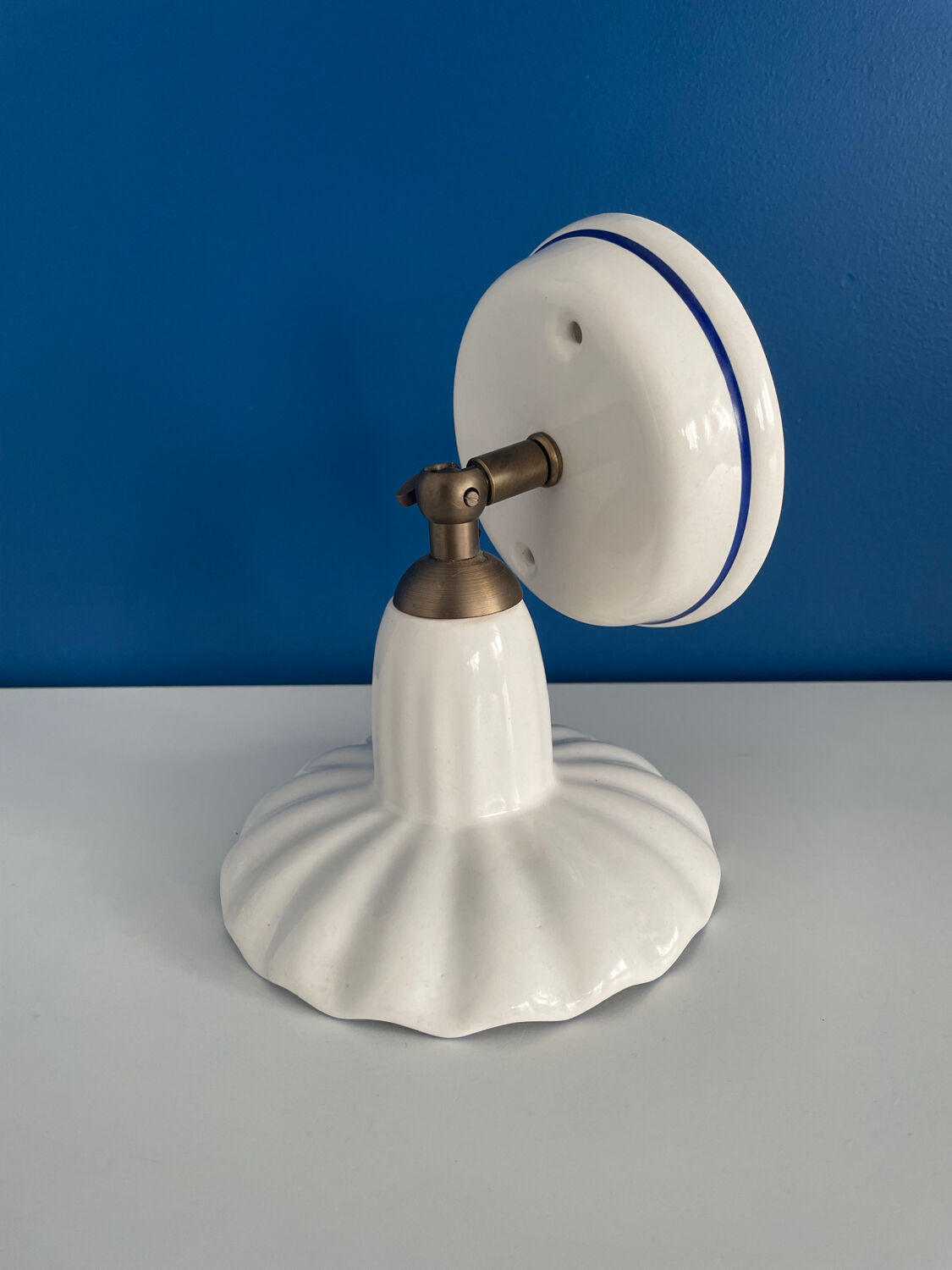 Wall lamp in blue and white porcelain made in italiy