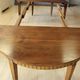 Louis XVI belt table with extensions in walnut, 19th century.