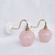 pair of vintage speckled pink and brass wall lights