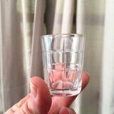 SUITE OF 11 GLASS SHOT GLASSES WITH SQUARE PATTERNS