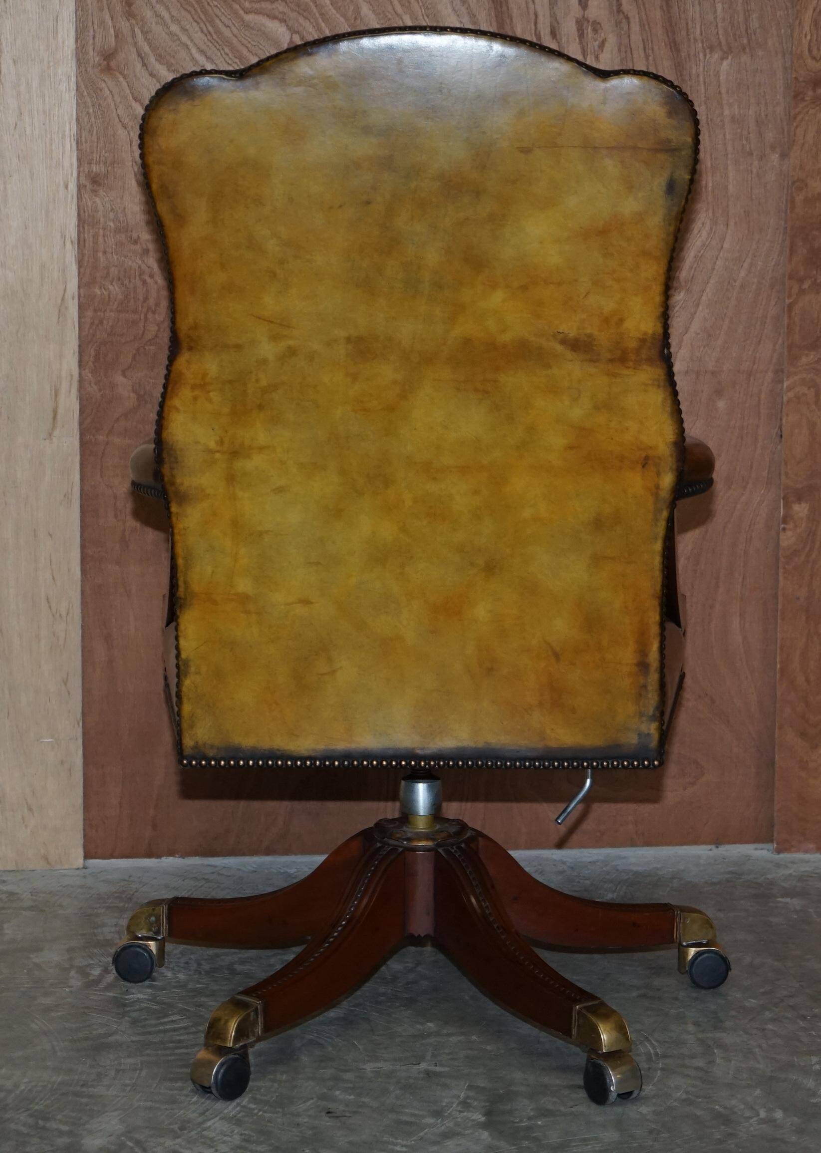 Restored vintage executive chair, leather, oak frame.