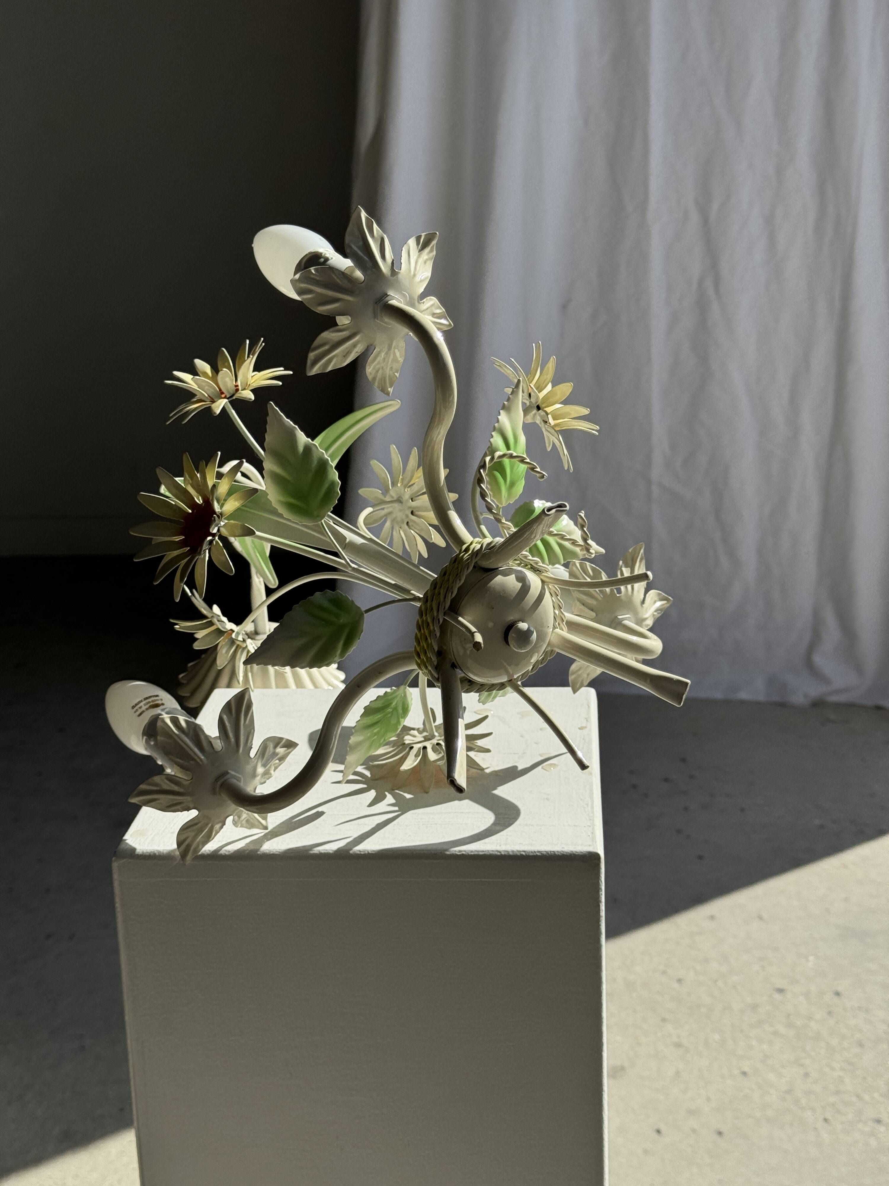 Small vintage cream metal flower chandelier with orange flowers and 3 arms.