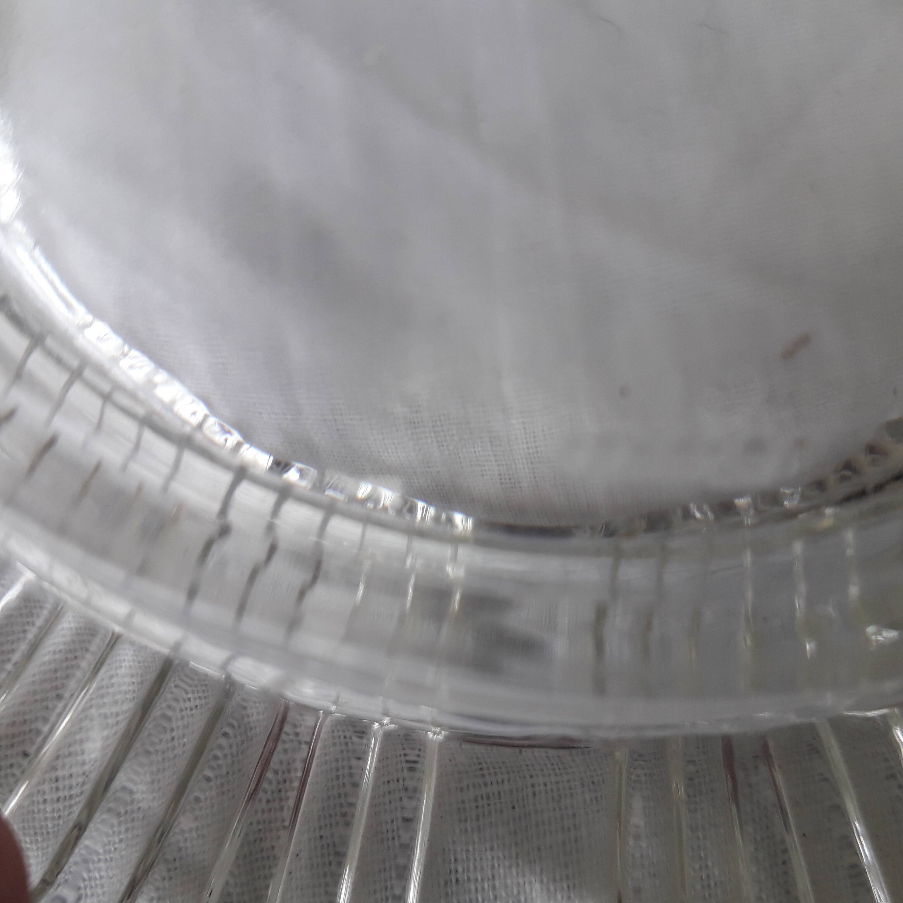 Ashtray or glass catchall.