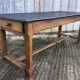 Antique oak farmhouse table with cat bar and 2 end drawers