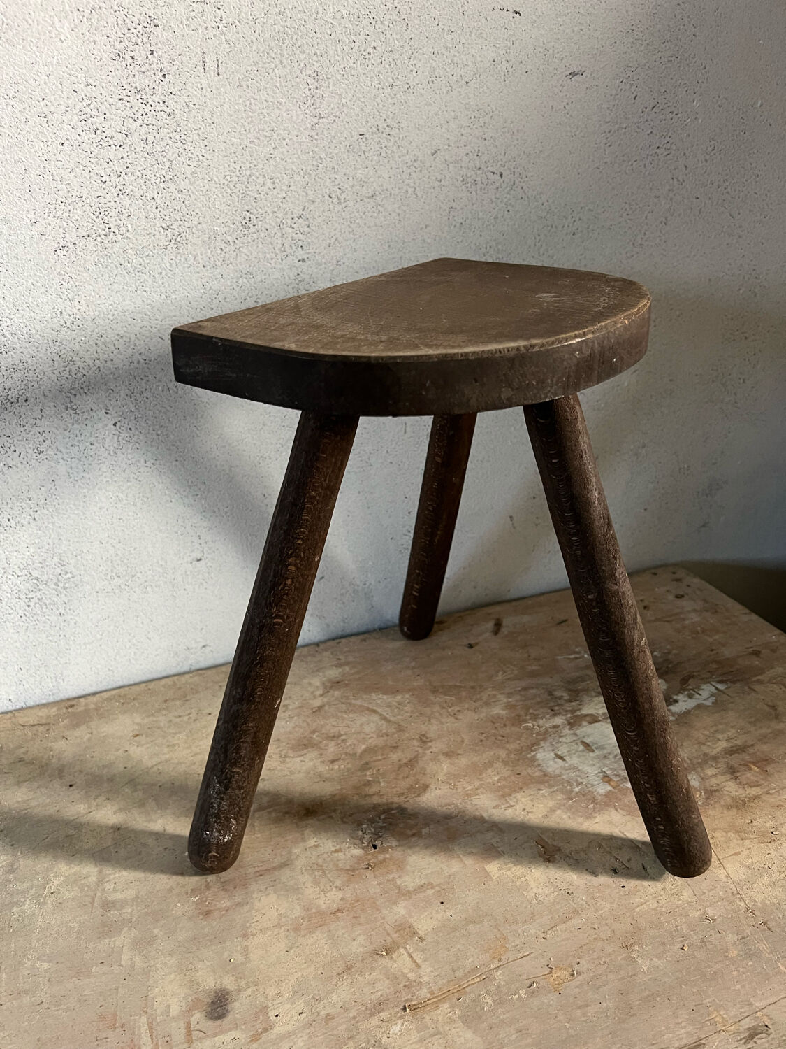 Wooden tripod stool