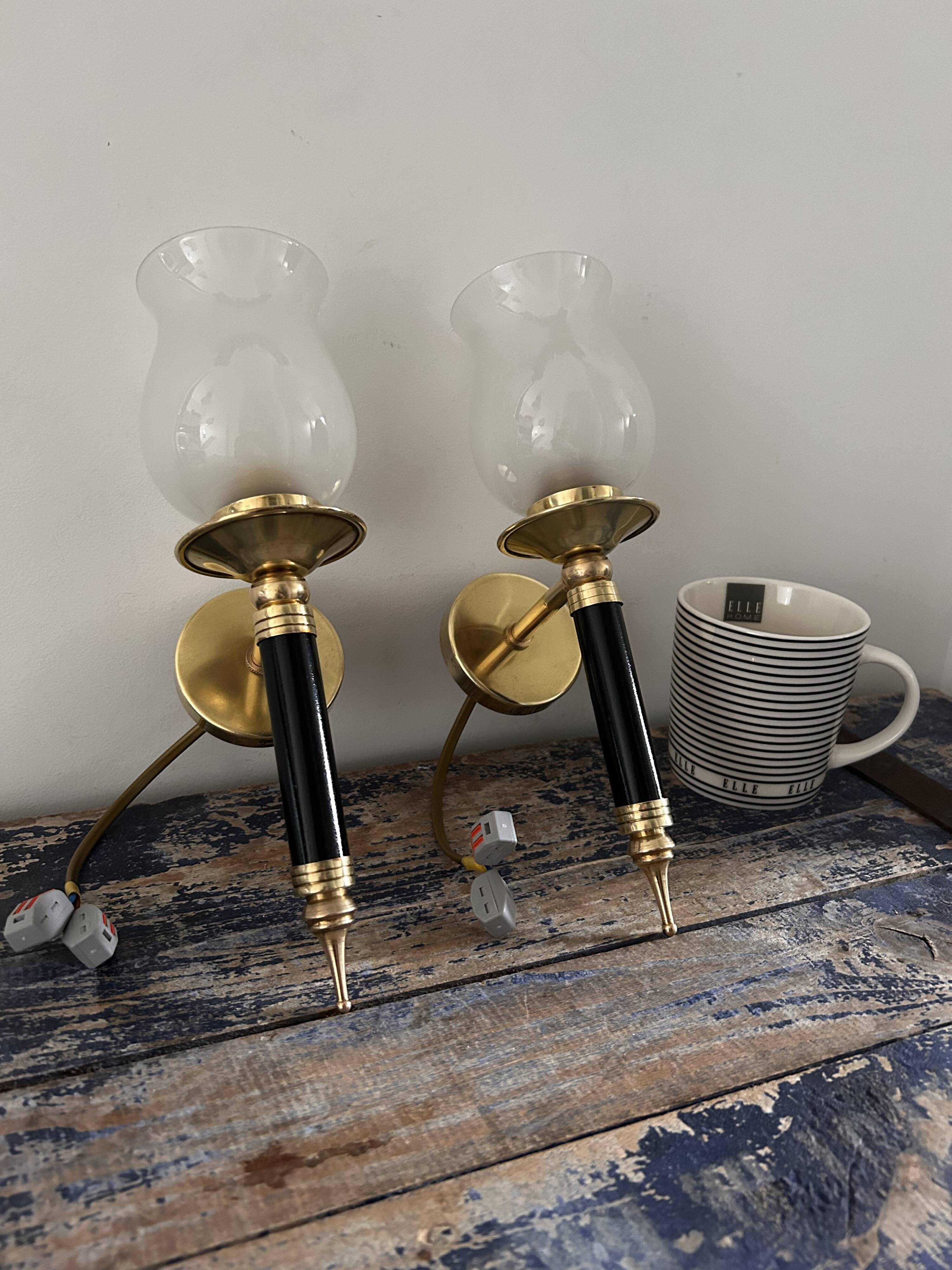 Pair of brass and black torchiere wall lights